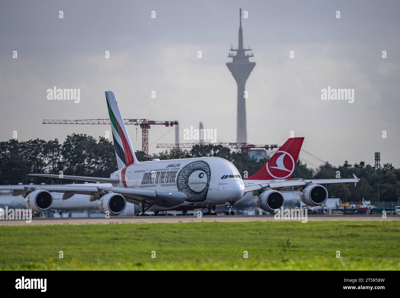 Düsseldorf International Airport, Emirates, Airbus A380-800, A6-EUT,on the taxiway for take-off, Rhine Tower, Stock Photo