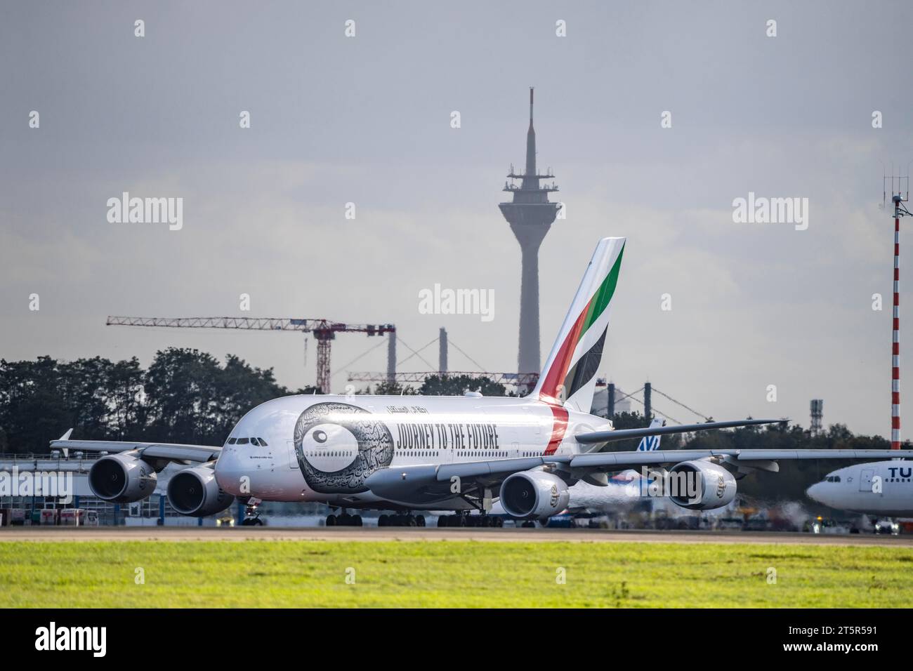 Düsseldorf International Airport, Emirates, Airbus A380-800, A6-EUT,on the taxiway for take-off, Rhine Tower, Stock Photo