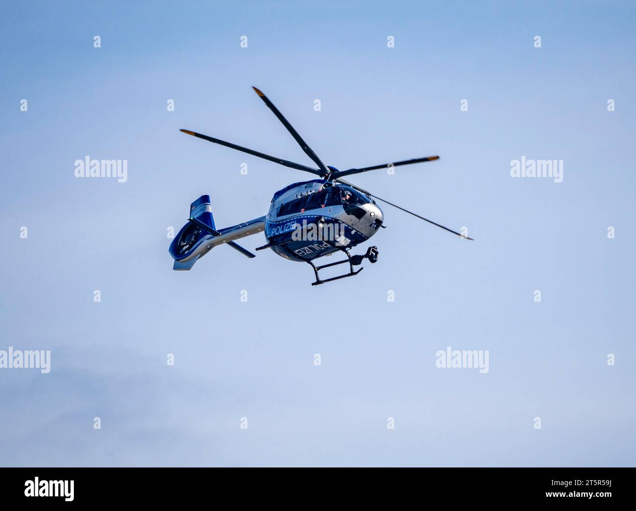 Police helicopter, Airbus Helicopters H145, of the NRW state police, after take-off at Düsseldorf Airport, police aviation squadron, Stock Photo