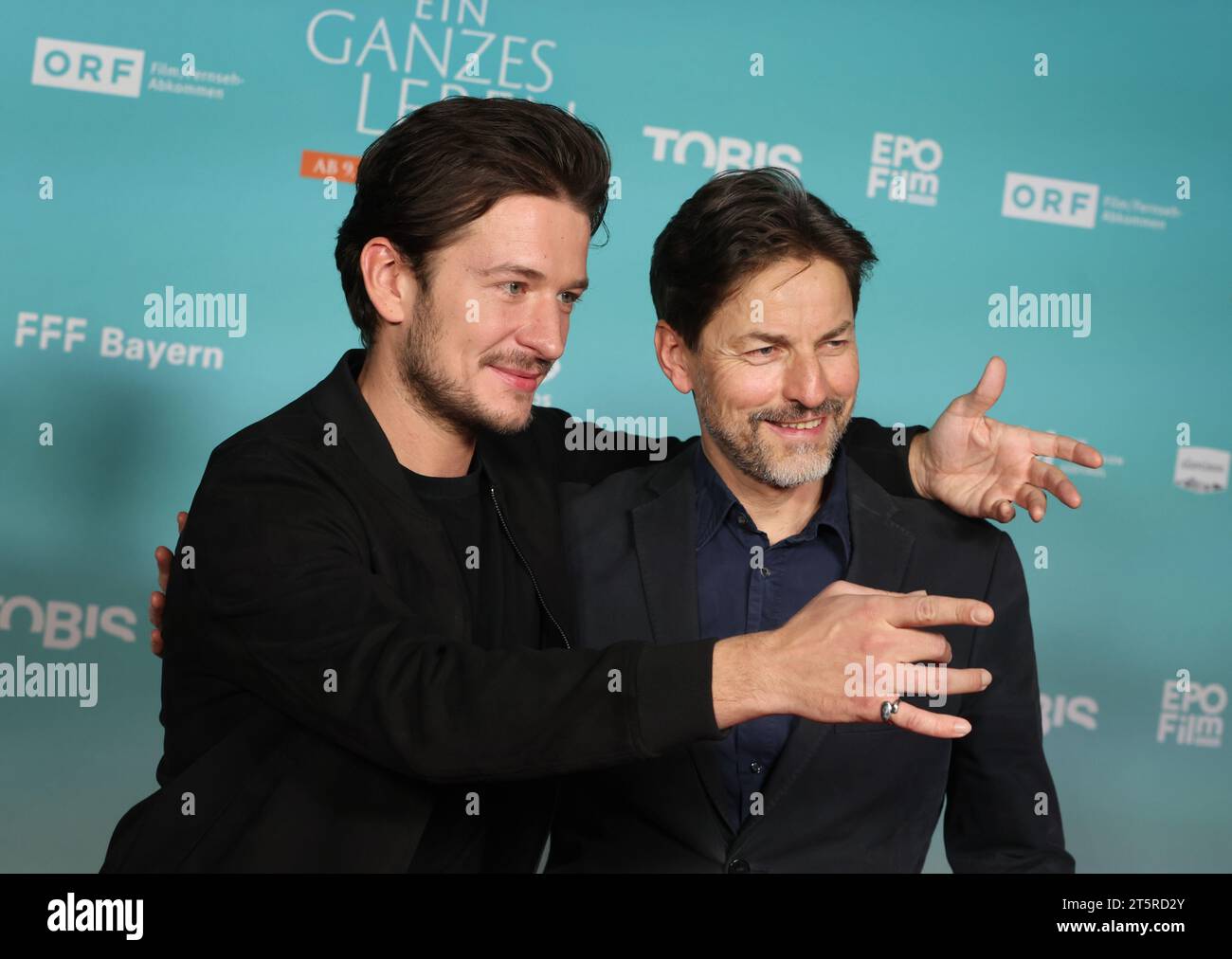 Munich, Germany. 06th Nov, 2023. Actor Stefan Gorski (l) and director Hans Steinbichler stand on the red carpet at the premiere of the film 'A Whole Life'. Credit: Karl-Josef Hildenbrand/dpa/Alamy Live News Stock Photo