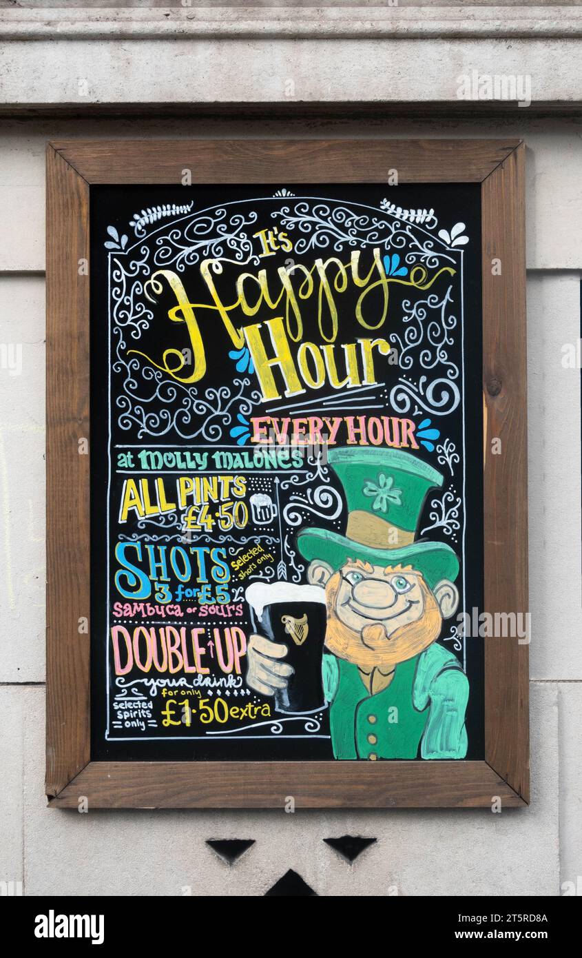 It's Happy Hour Everyhour sign outside Irish Pub in Liverpool Stock