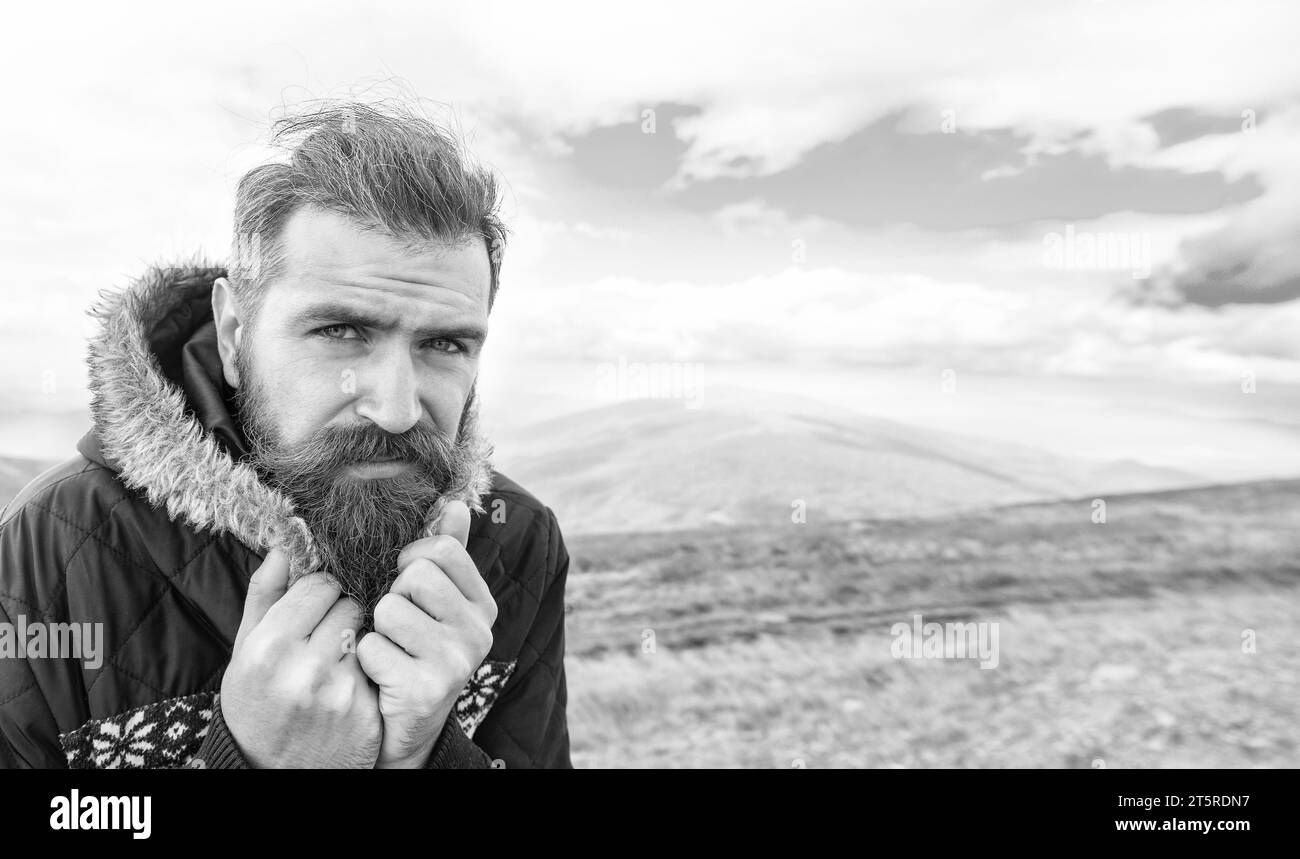 bearded man having moustache, banner. photo of bearded man in the mountain. Stock Photo