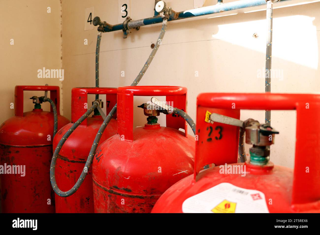 liquid petroleum gas (LPG) cylinders stored in a chamber Stock Photo