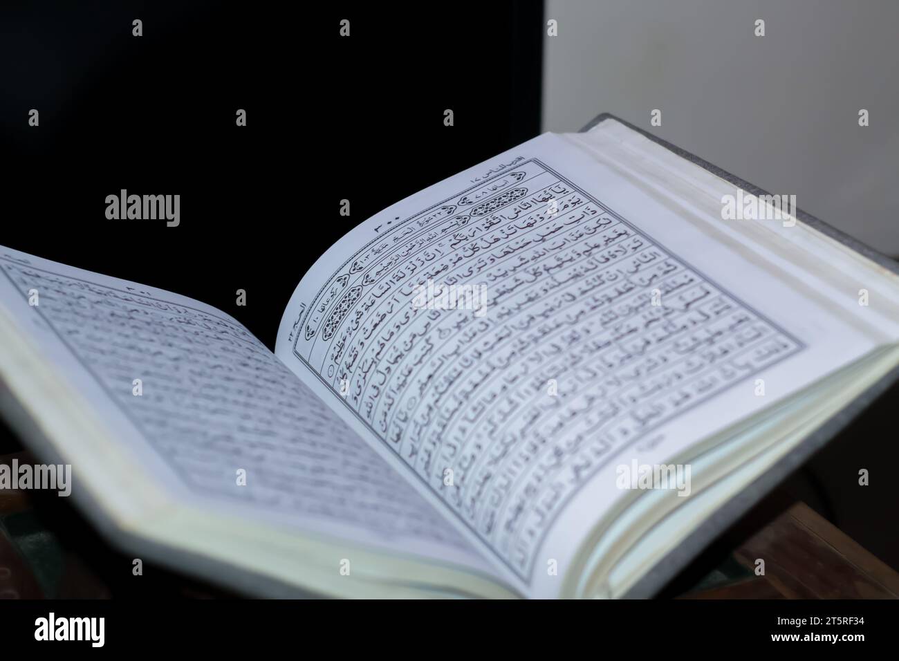 Open the holy quran book | Verse by surah al hajj Stock Photo