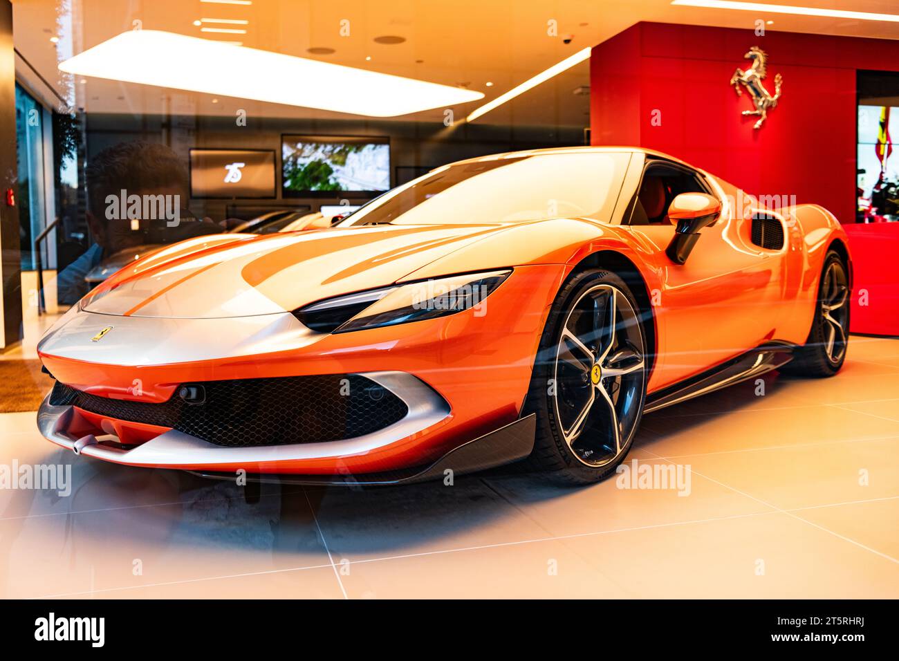 New York City, USA - August 09, 2023: Ferrari 296 GTS 2022 tuned sport car in showroom, corner view. Stock Photo
