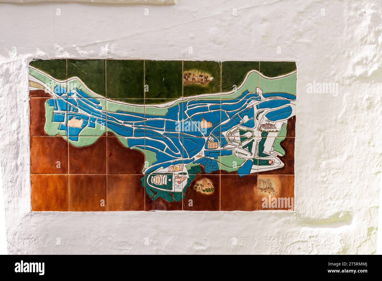 A town map of Mijas, Spain made from ceramic tiles set in a white wall Stock Photo Alamy