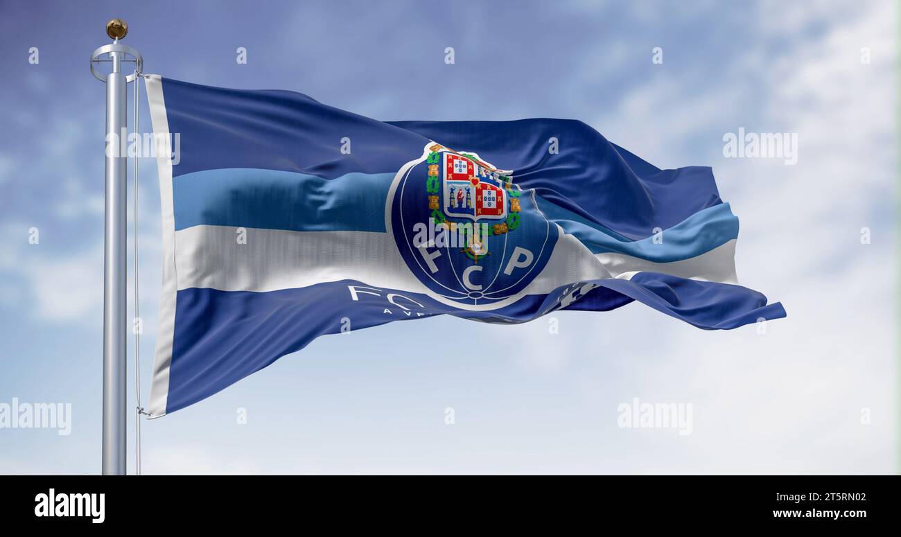 Porto, PT, Oct. 20 2023: FC Porto flag waving in the wind on a clear day. Portuguese sports club based in Porto. Illustrative editorial 3D illustratio Stock Photo