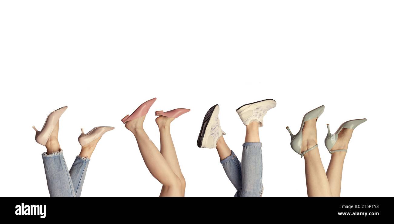 Four pairs of different women's shoes on feet, upside down collage on a white background with copy space Summer shoe sale layout. Fashion blog concept Stock Photo
