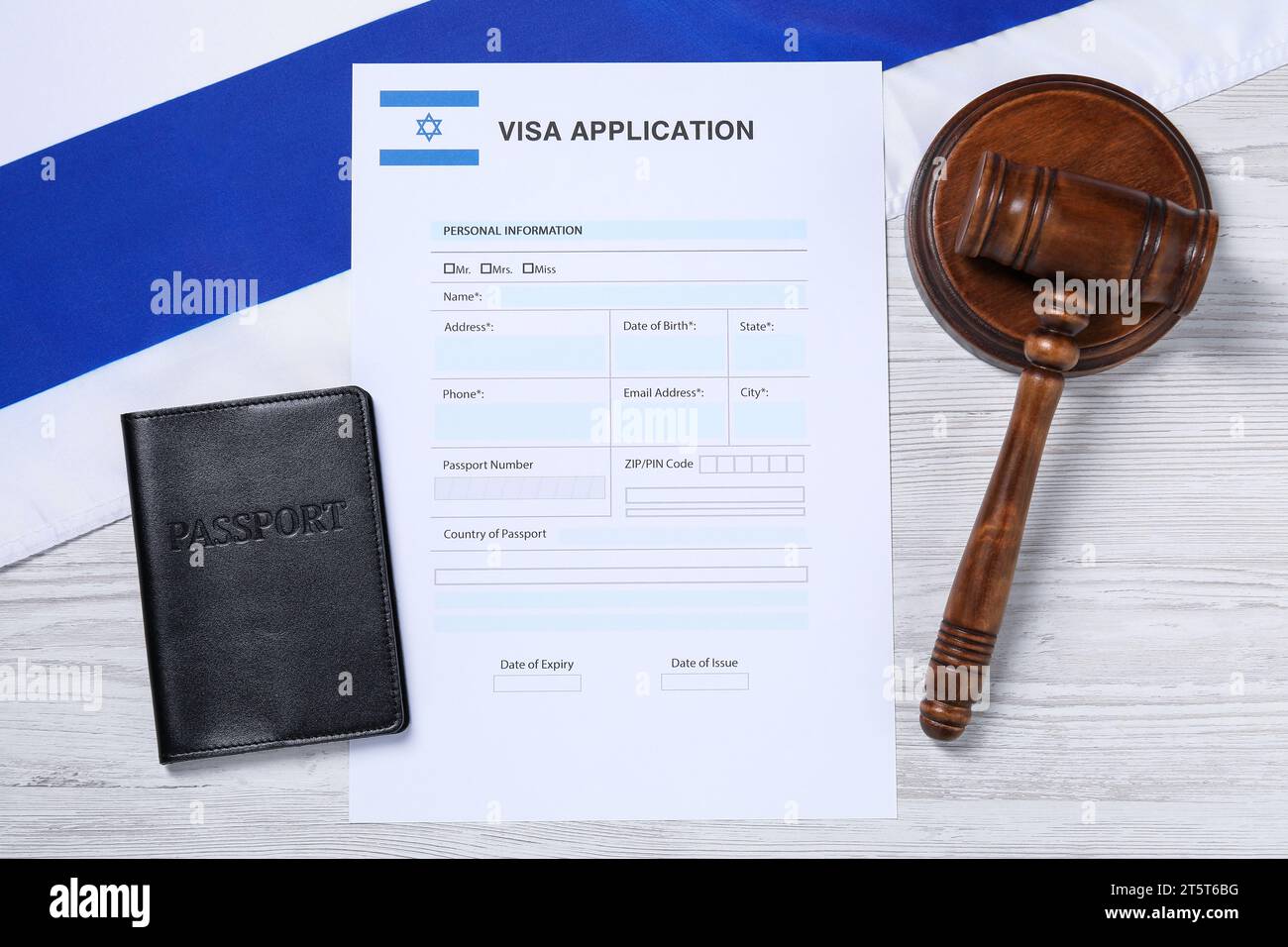 Immigration To Israel Visa Application Form Gavel Passport And Flag On White Wooden Table immigration-to-israel-visa-application-form-gavel-passport-and-flag-on-white-wooden-table