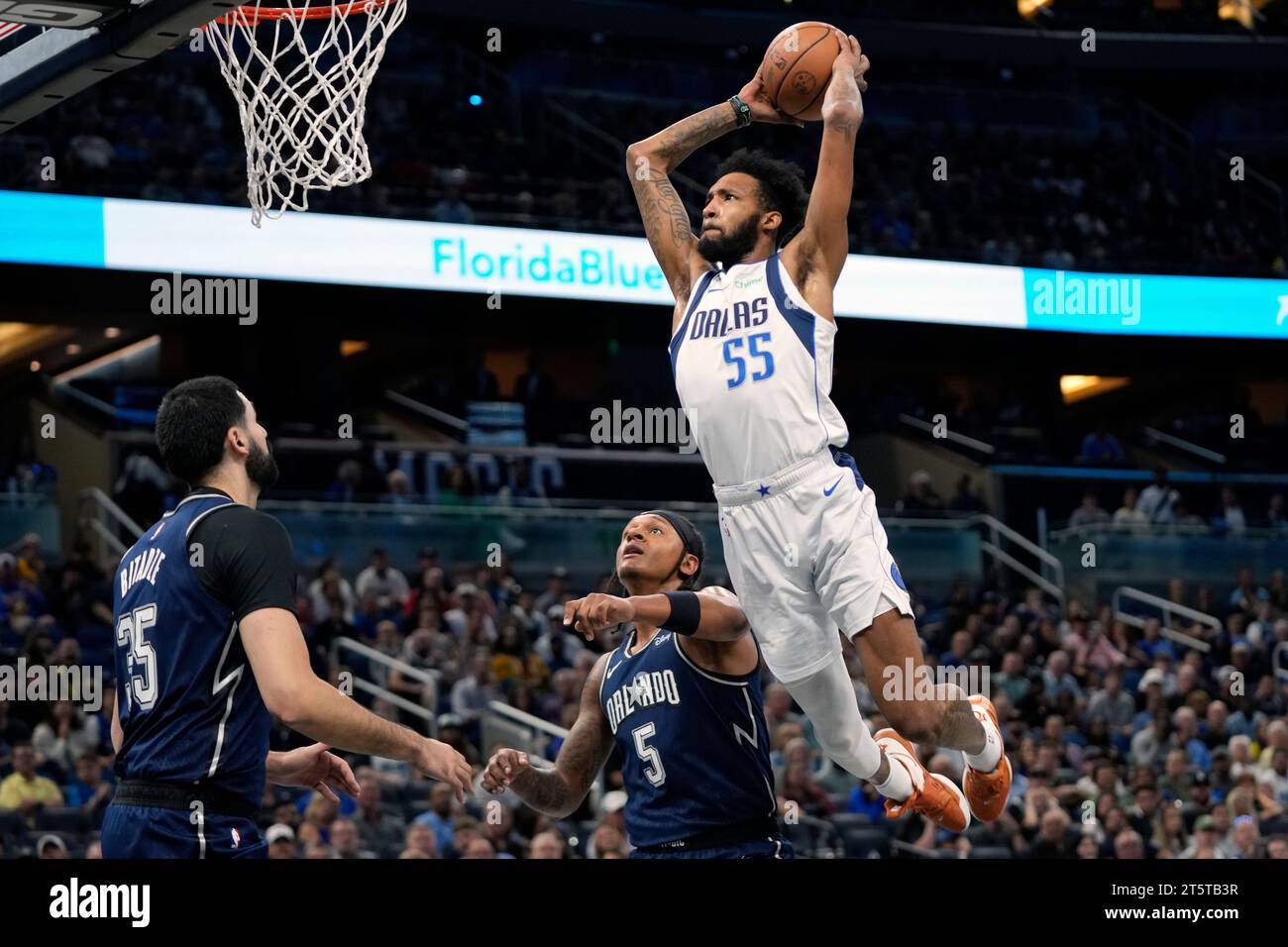 Dallas Mavericks' Derrick Jones Jr. (55) Dunks The Ball Over Orlando ...