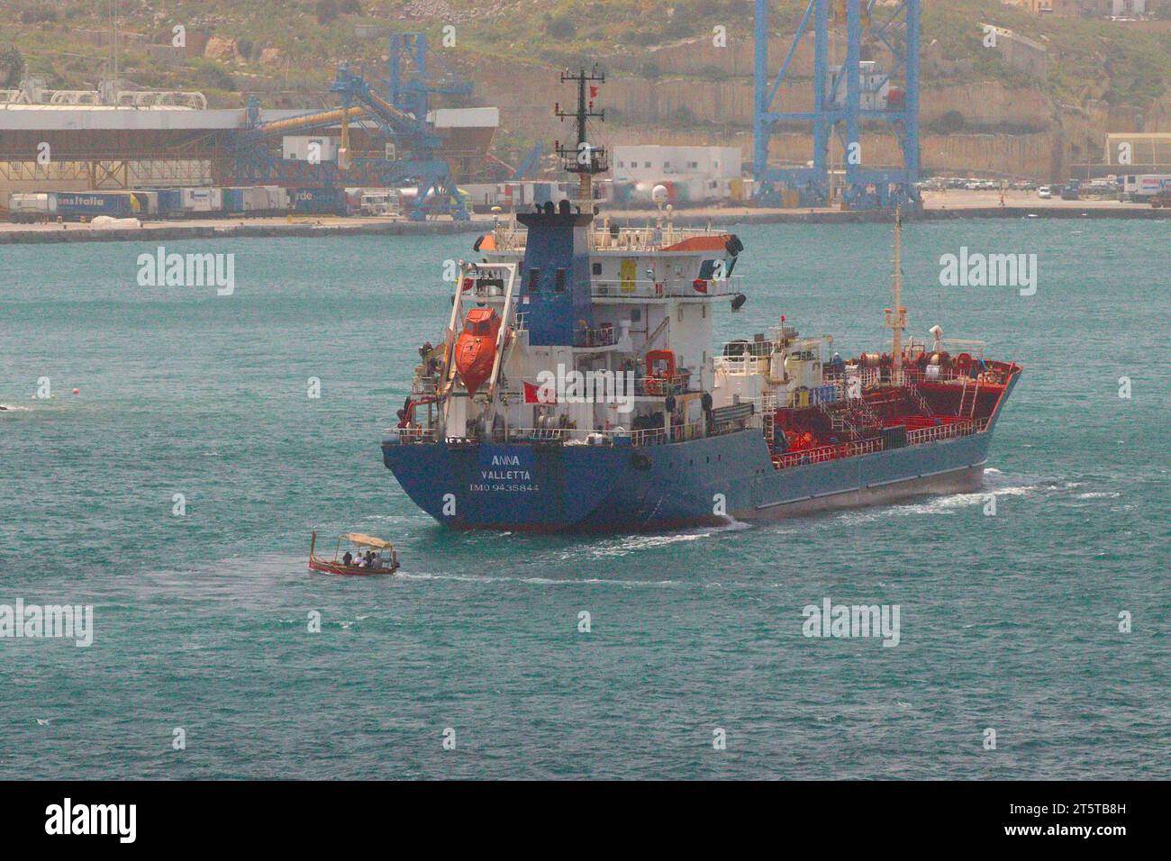 The bunkering tanker MV Anna enters the sheltered waters of Valletta Grand Harbour, April 2023. Her former names were;  Leon, Marim, Kejin 2. Stock Photo