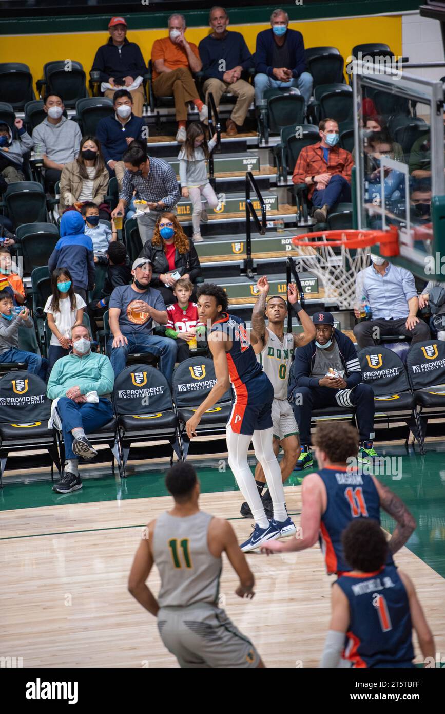 College Basketball player Shooting a made shot Stock Photo