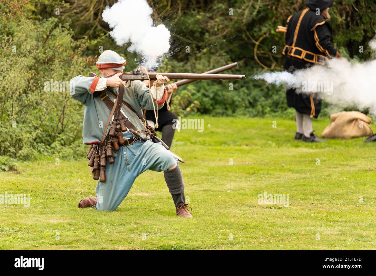 A musketeer firing a flintlock musket - the Siege of Basing House, from the English civil war, English Civil War Society 16.09.23, Basingstoke Stock Photo