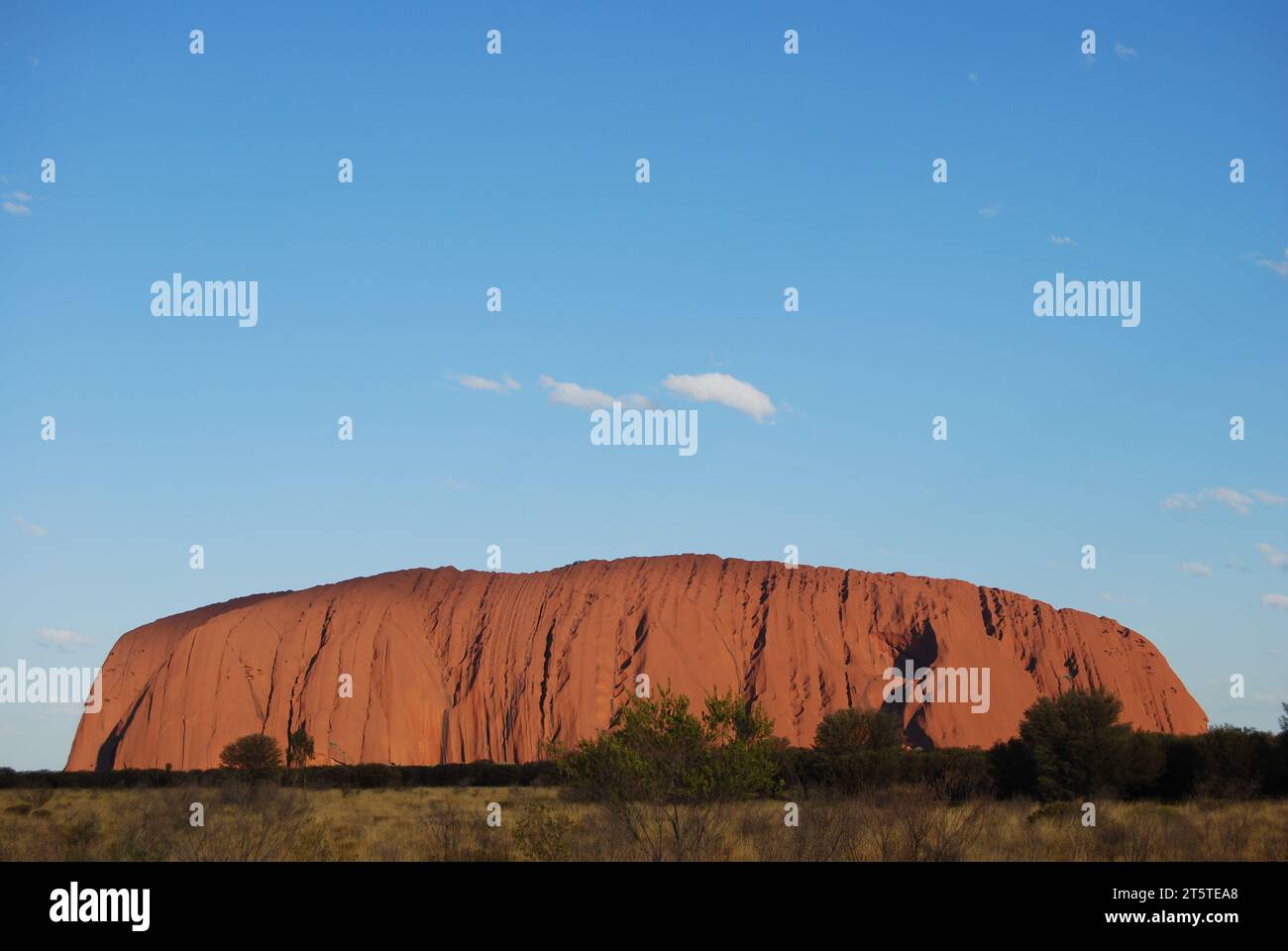Ayers rock and the clear blue sky. Stock Photo