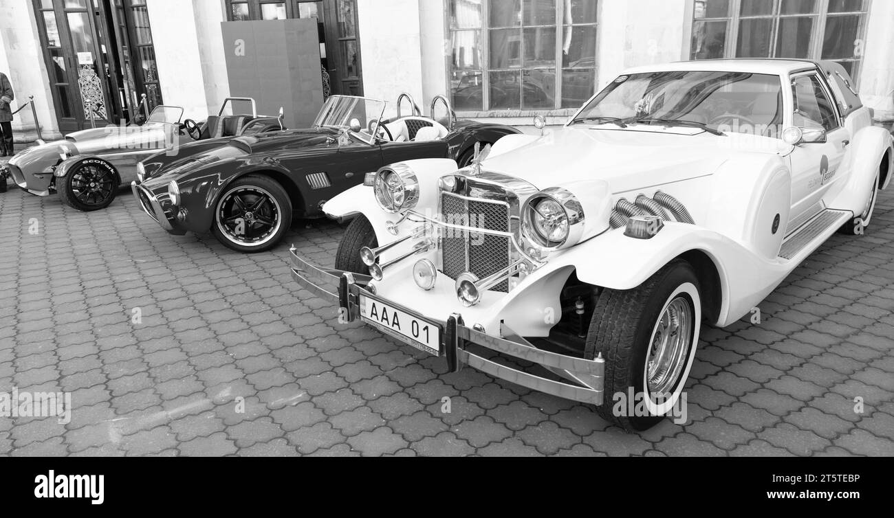 Kyiv, Ukraine - November 02, 2022: retro ac cobra and zimmer golden spirit car, corner view Stock Photo