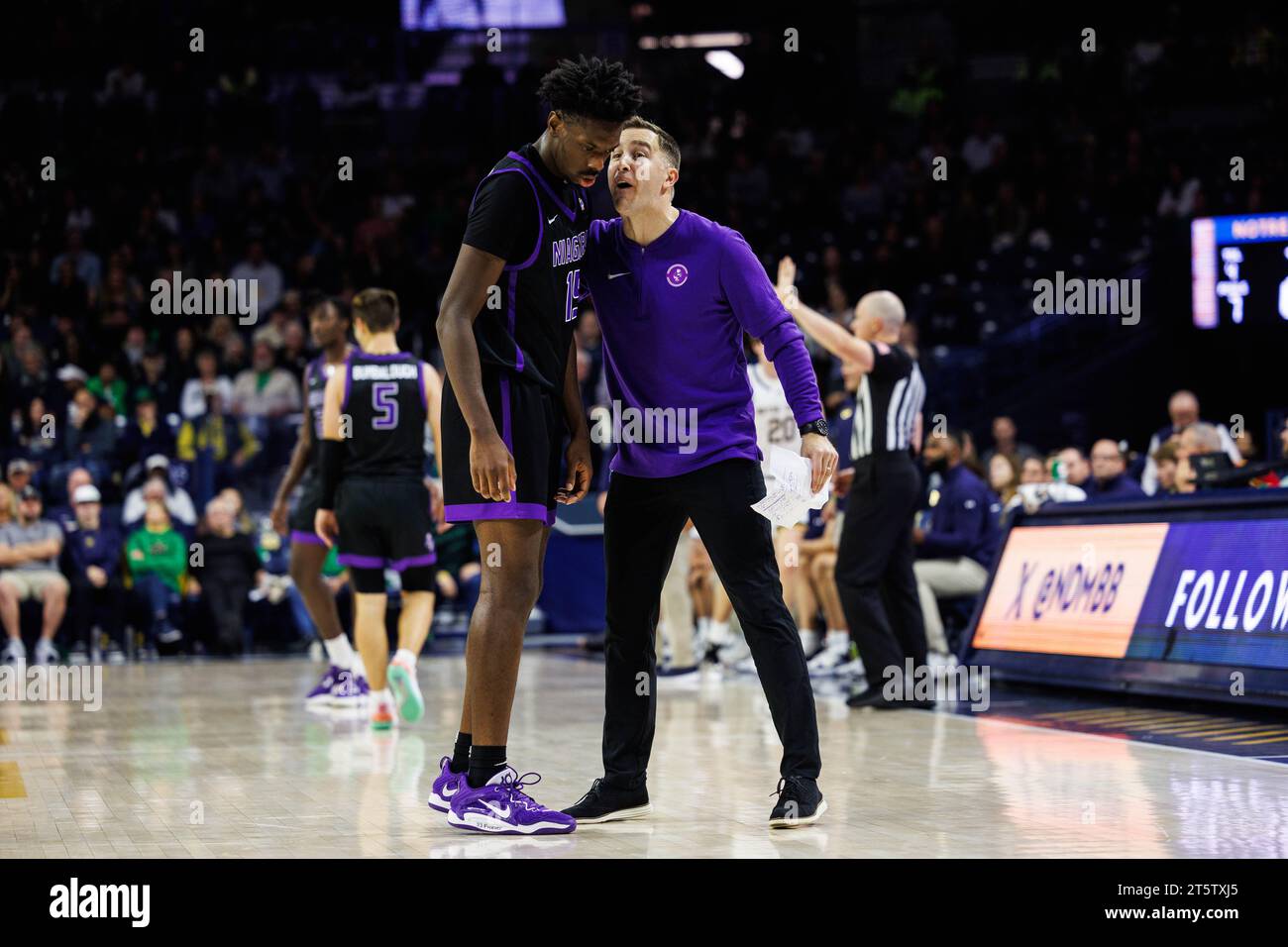 South Bend, Indiana, USA. 06th Nov, 2023. Niagara head coach Greg Paulus encourages Niagara Forward Yaw Obeng-Mensah (15) during NCAA basketball game action between the Niagara Purple Eagles and the Notre Dame Fighting Irish at Purcell Pavilion at the Joyce Center in South Bend, Indiana. Notre Dame defeated Niagara 70-63. John Mersits/CSM/Alamy Live News Stock Photo