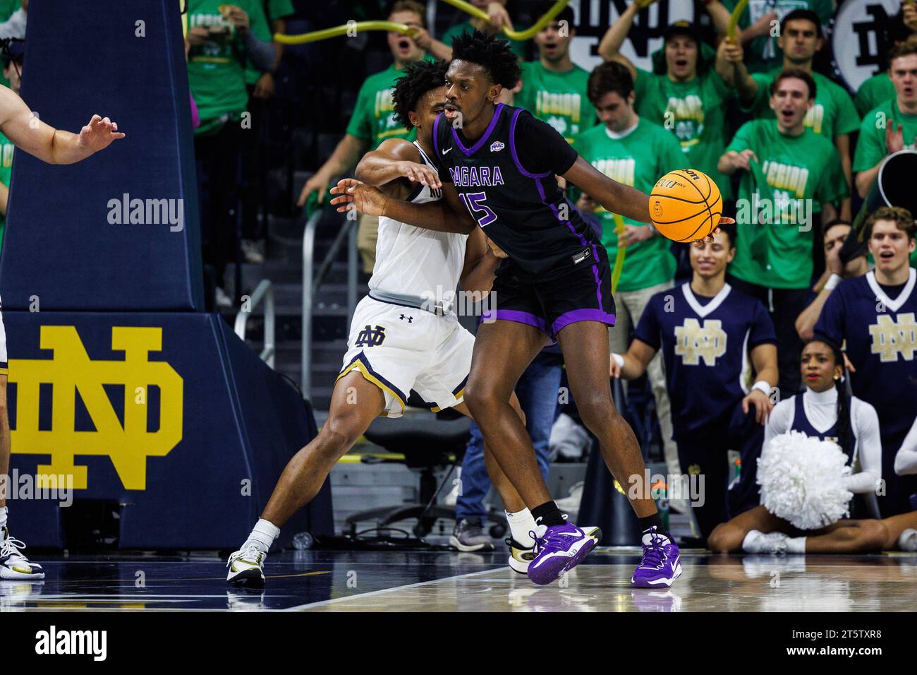 South Bend, Indiana, USA. 06th Nov, 2023. Niagara Forward Yaw Obeng-Mensah (15) pivots to the basket as Notre Dame guard Julian Roper II (1) defends during NCAA basketball game action between the Niagara Purple Eagles and the Notre Dame Fighting Irish at Purcell Pavilion at the Joyce Center in South Bend, Indiana. Notre Dame defeated Niagara 70-63. John Mersits/CSM/Alamy Live News Stock Photo