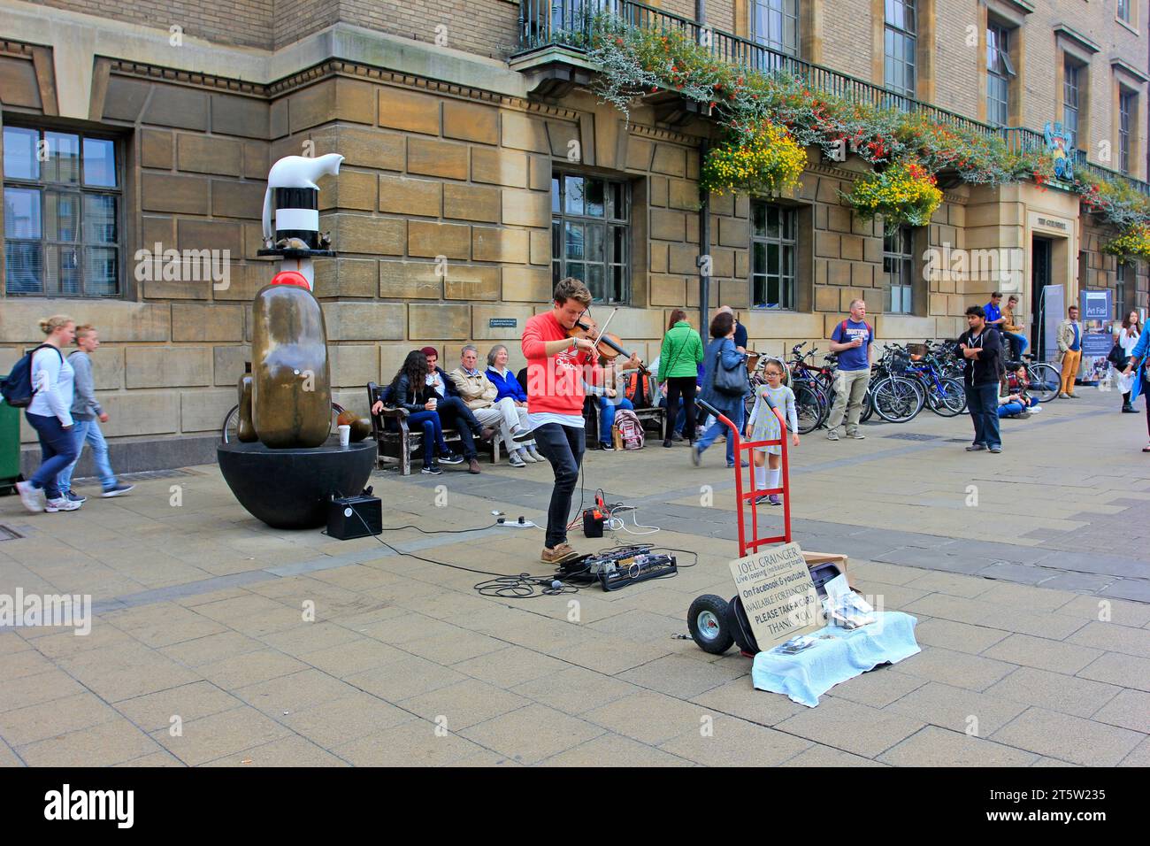Cambridge October 3 A man playing violin in the street, on October 3
