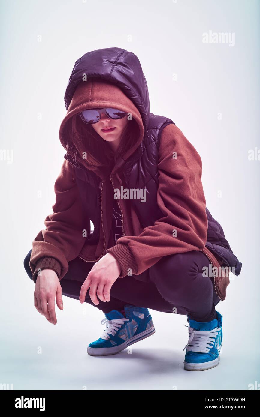 Casual attire crouches hi-res stock photography and images - Alamy