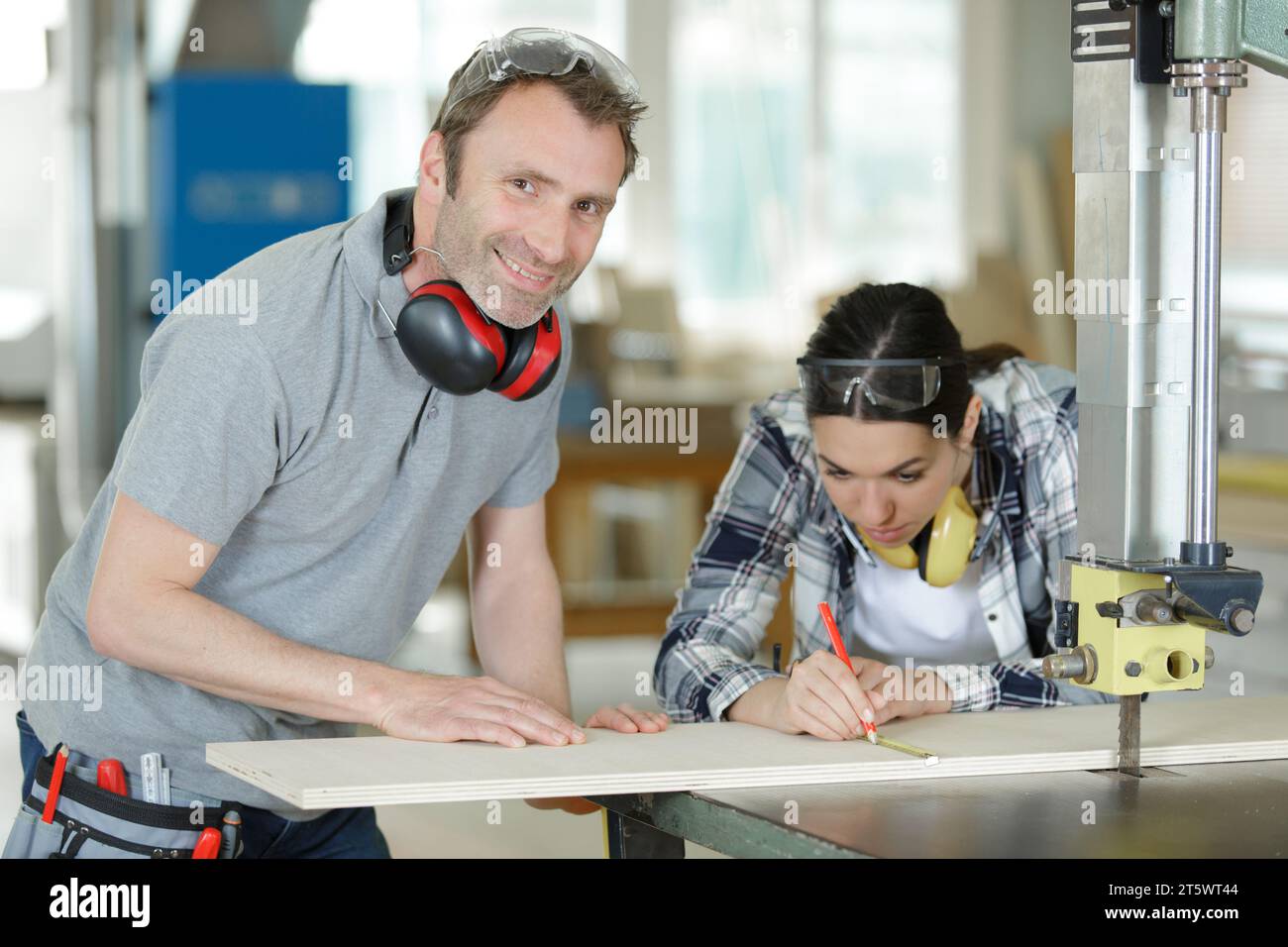 Female apprentice learning tool hi-res stock photography and images - Alamy