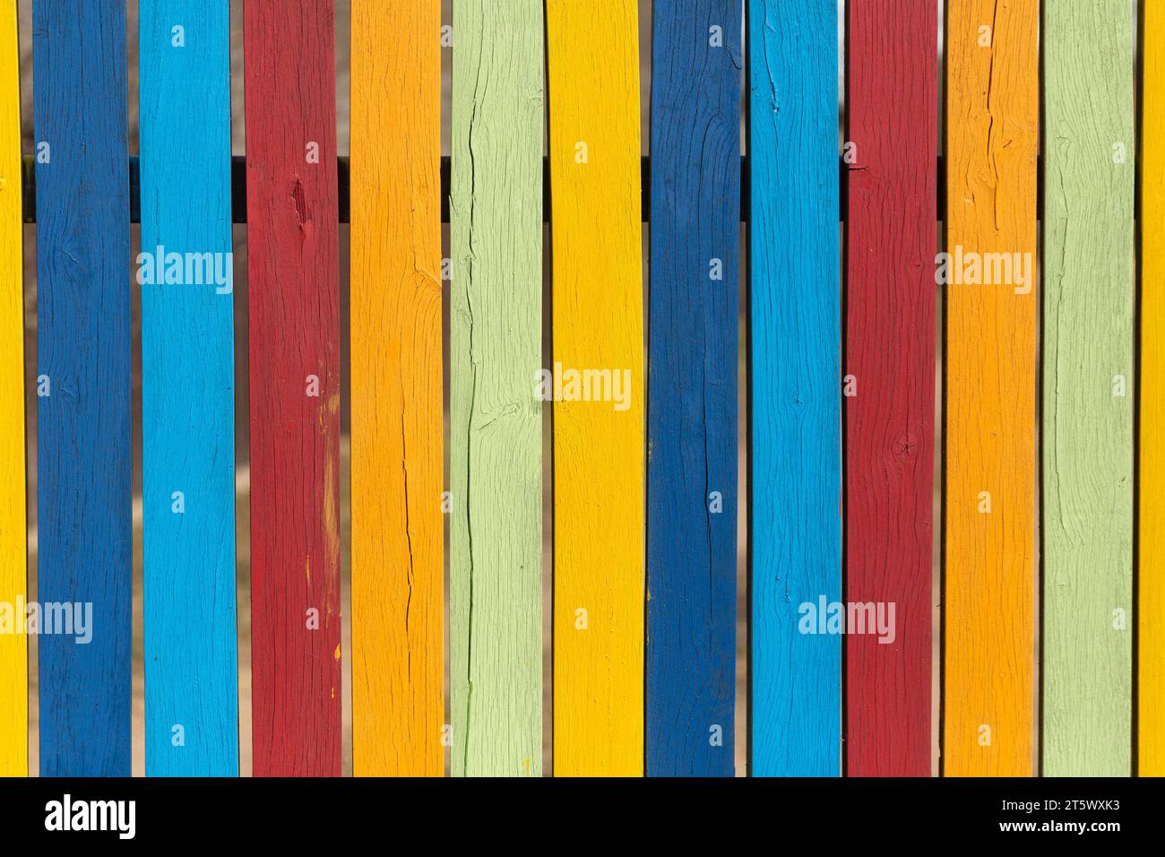 Colored fence boards painted in different colors Stock Photo