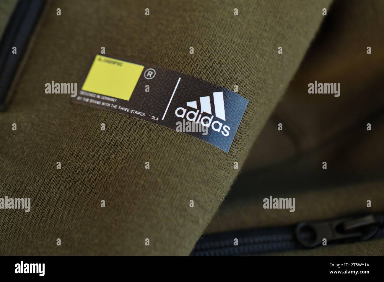 KYIV, UKRAINE - 4 MAY, 2023: Adidas company logo on new brand clothes close up Stock Photo