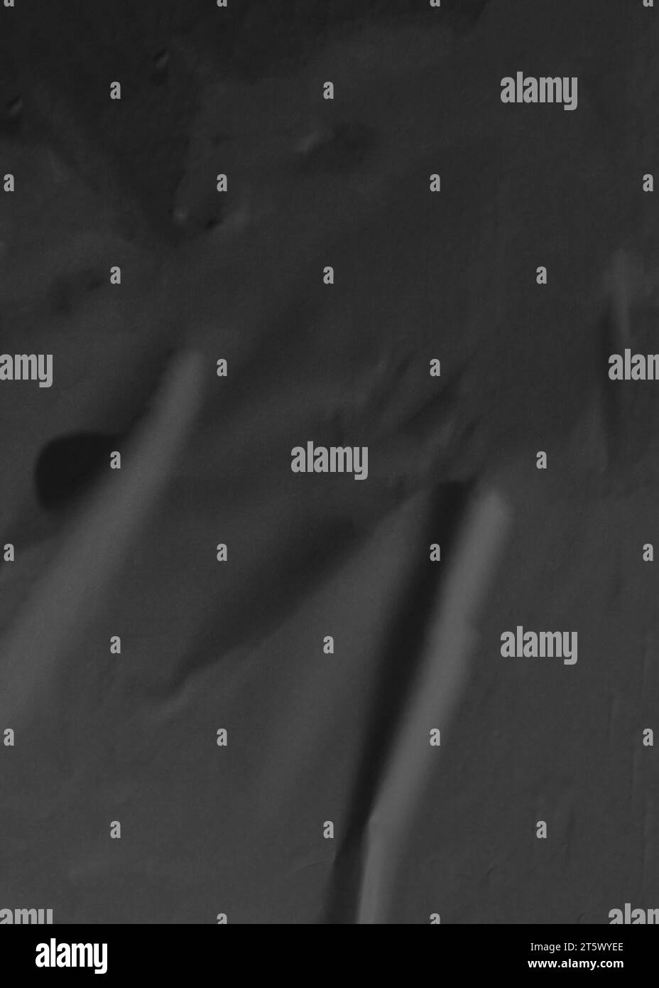 Black crumpled paper background texture Stock Photo - Alamy