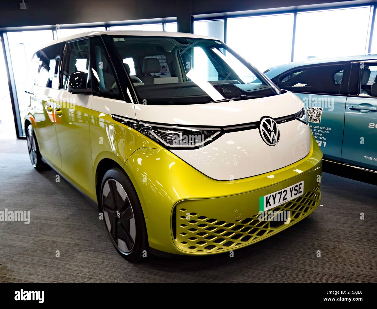 Threequarters front view of a 2022, Candy White and Lime Yellow, VW ID
