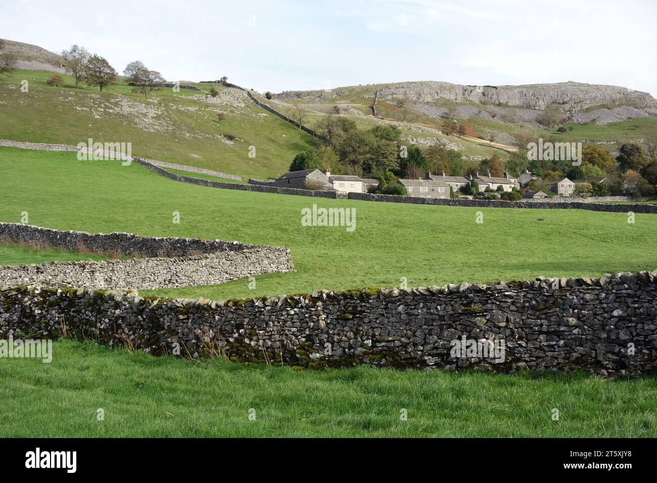 The Farming Hamlet of Feizor Below Pot Scar from the Pennine Bridleway to Austwick in the Yorkshire Dales National Park, England, UK. Stock Photo