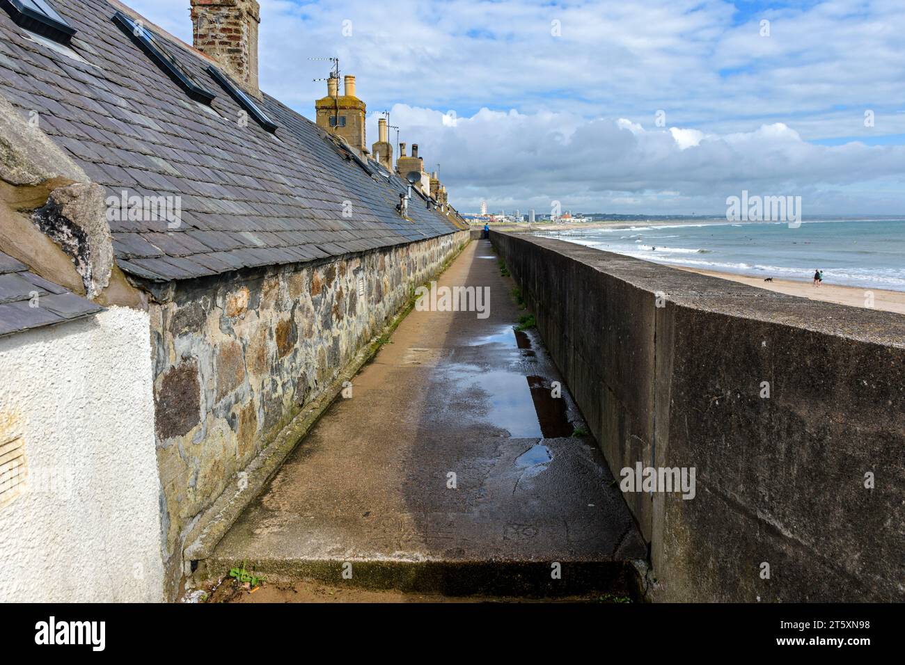 Back of a row of houses in the historic former fishing village of Footdee, built with their