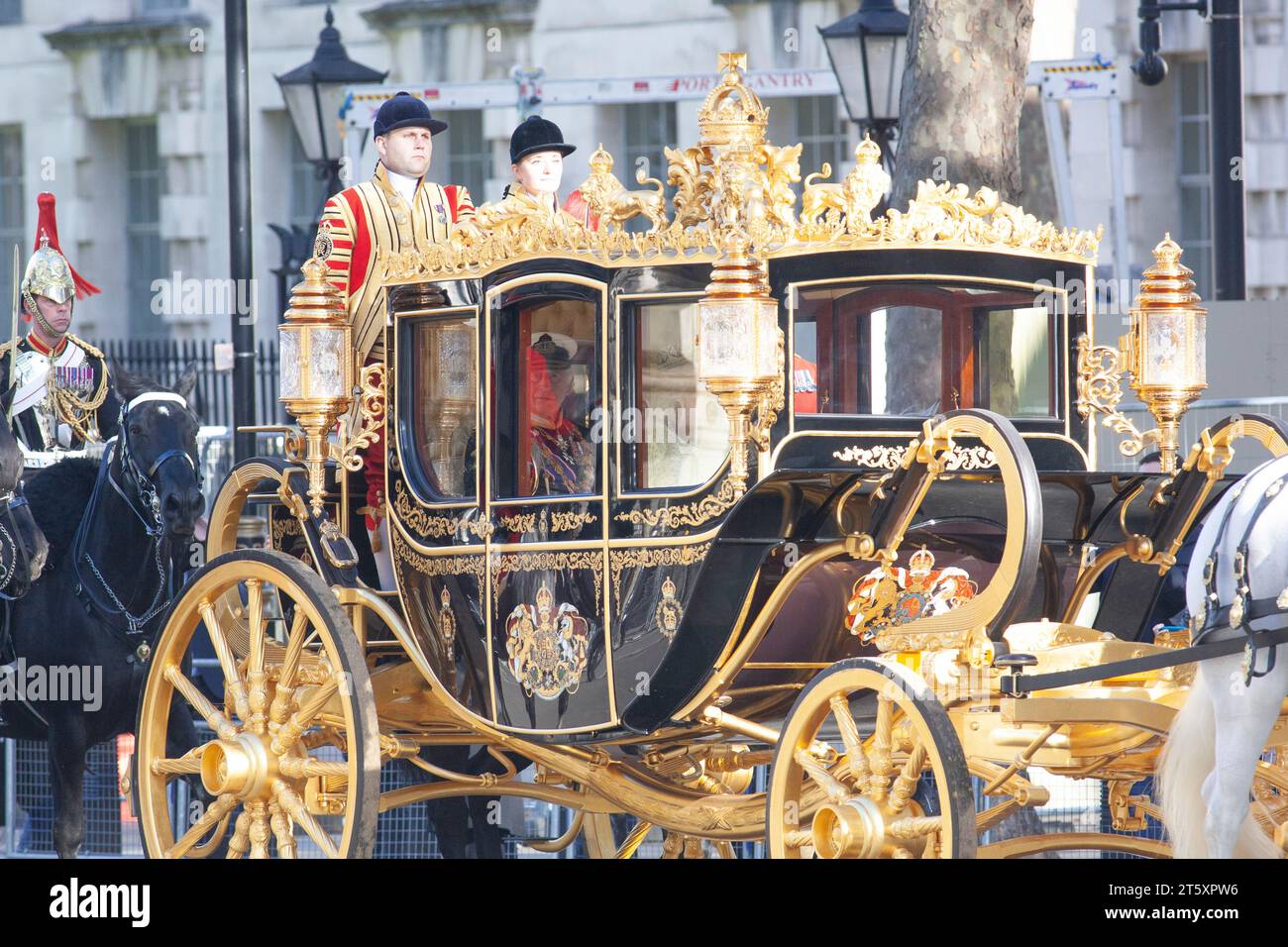London, UK. 7th Nov, 2023. King Charles was driven along Parliament Street on the way to the State Opening of Parliament, where he will announce the government's legislative plans until the next election. He rode in a state carriage but was met with some protesters waving 'Not My King' flags and placards. Credit: Anna Watson/Alamy Live News Stock Photo