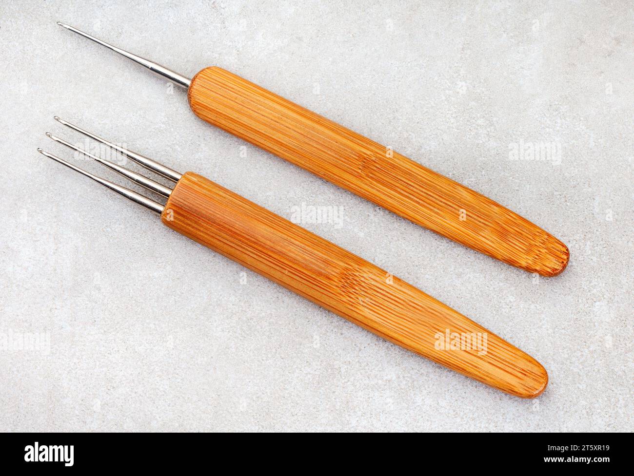 Hair crochet needles for dreadlocks and braids on white Stock Photo Alamy