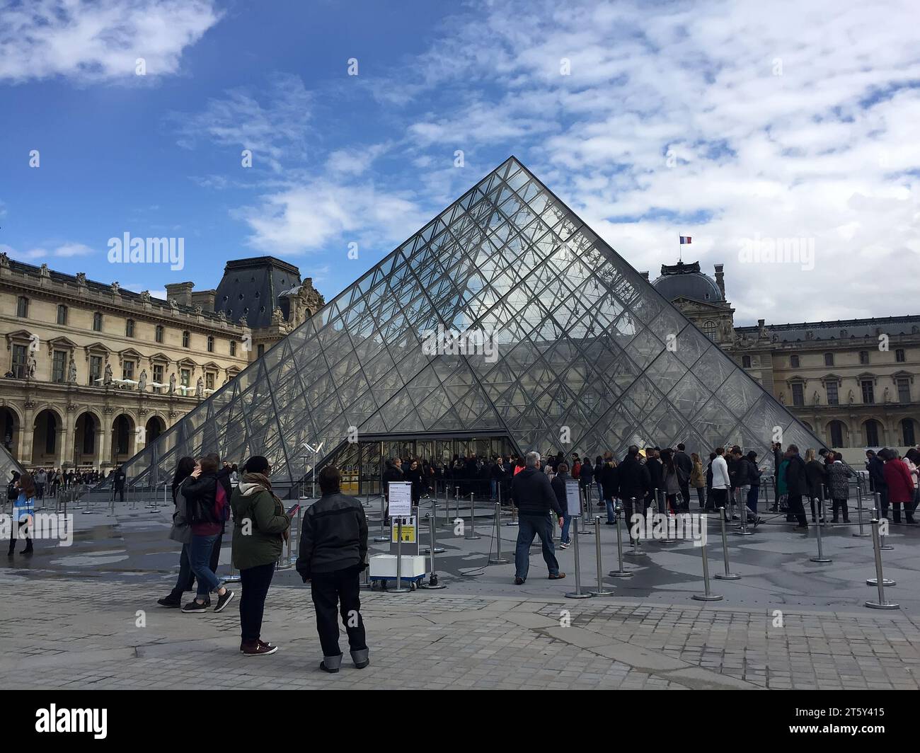 Paris - April 17, 2016: glass Pyramid, Le Louvre Museum, Paris, France Stock Photo