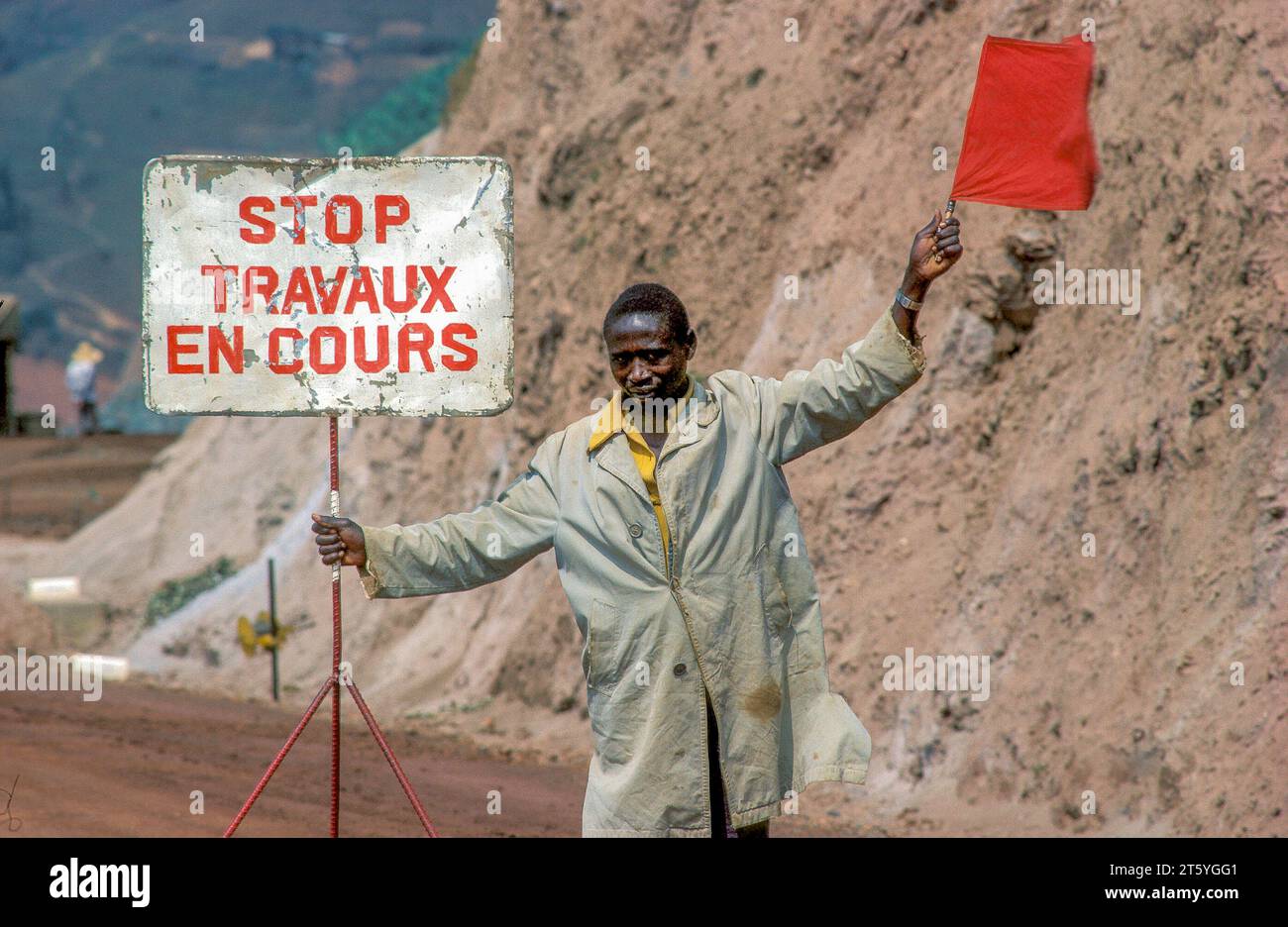 Rwanda, traffic is stopped because of the construction work by a ...