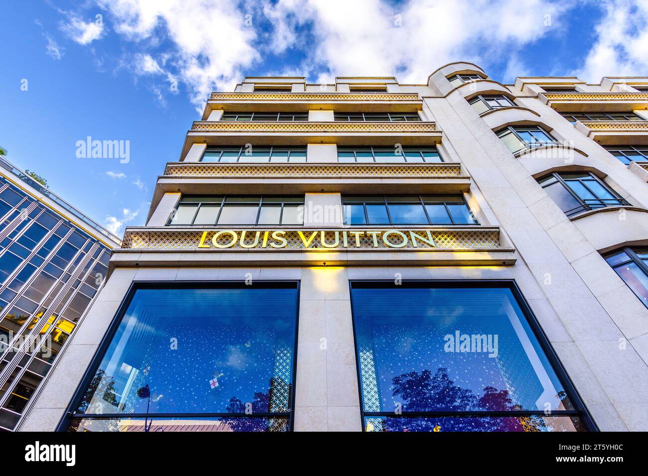 Exterior of the Louis Vuitton luxury store at 101 Avenue des Champs-Elysées, 75008 Paris, France. Stock Photo