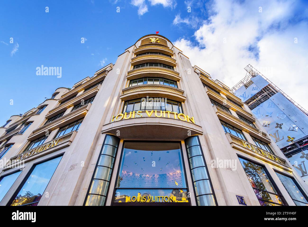 Exterior of the Louis Vuitton luxury store at 101 Avenue des Champs-Elysées, 75008 Paris, France. Stock Photo