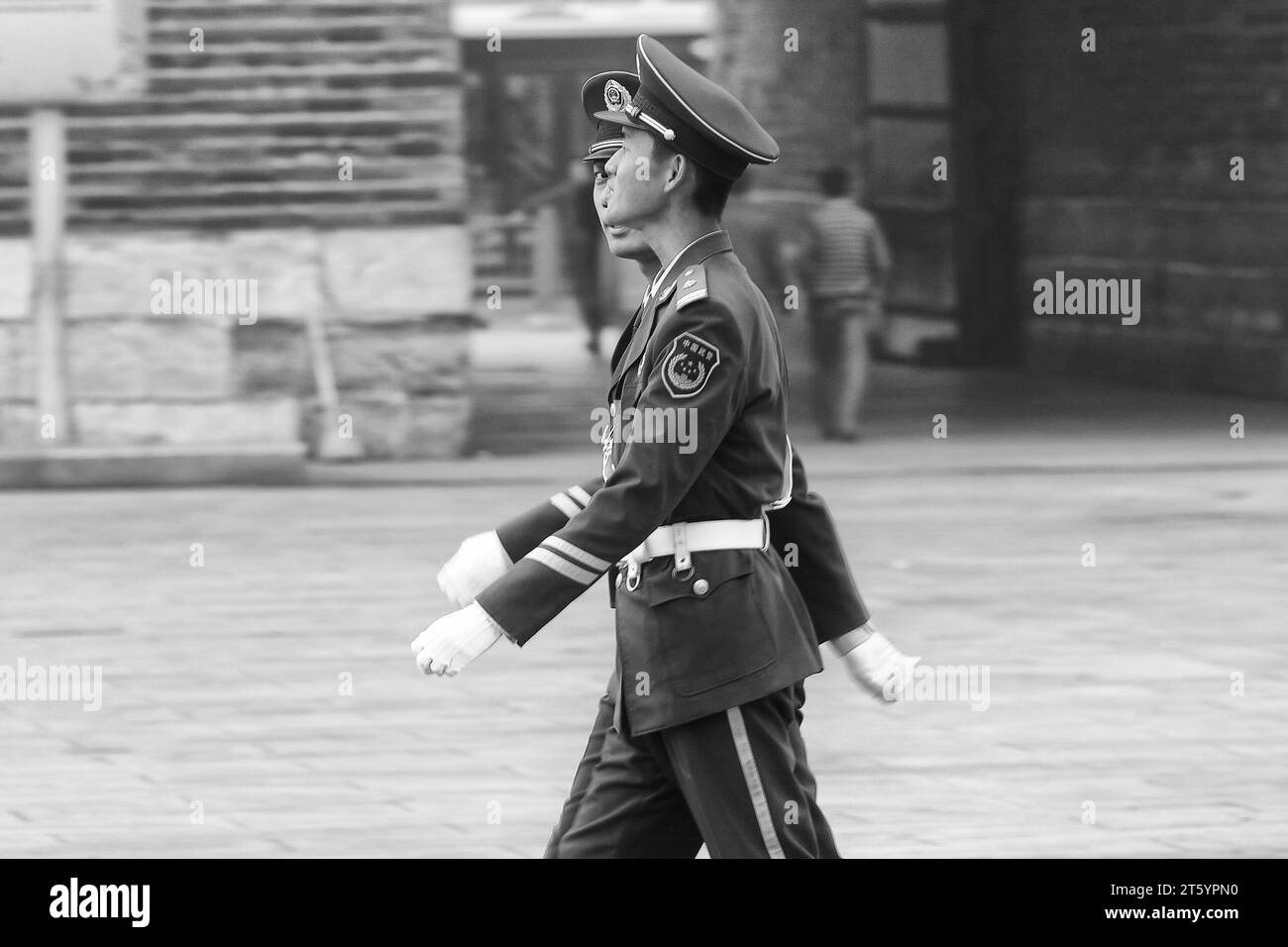 Black And White Photo Of Two People's Liberation Army Soldiers Marching Near Tiananmen Square, Beijing, China. Stock Photo