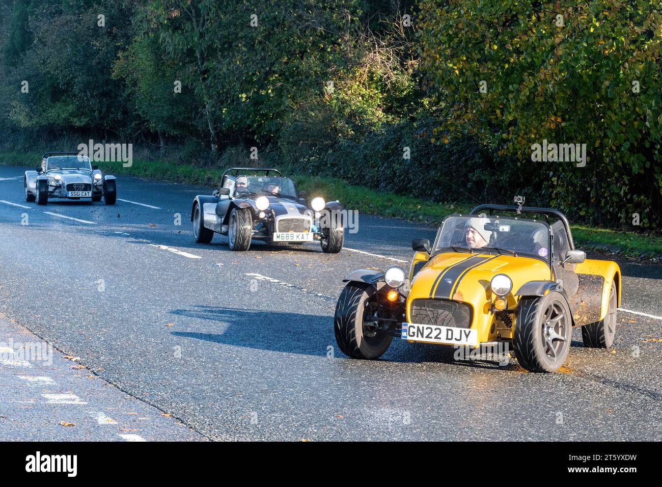 Caterham and Lotus Seven Club sports cars on the road, England, UK