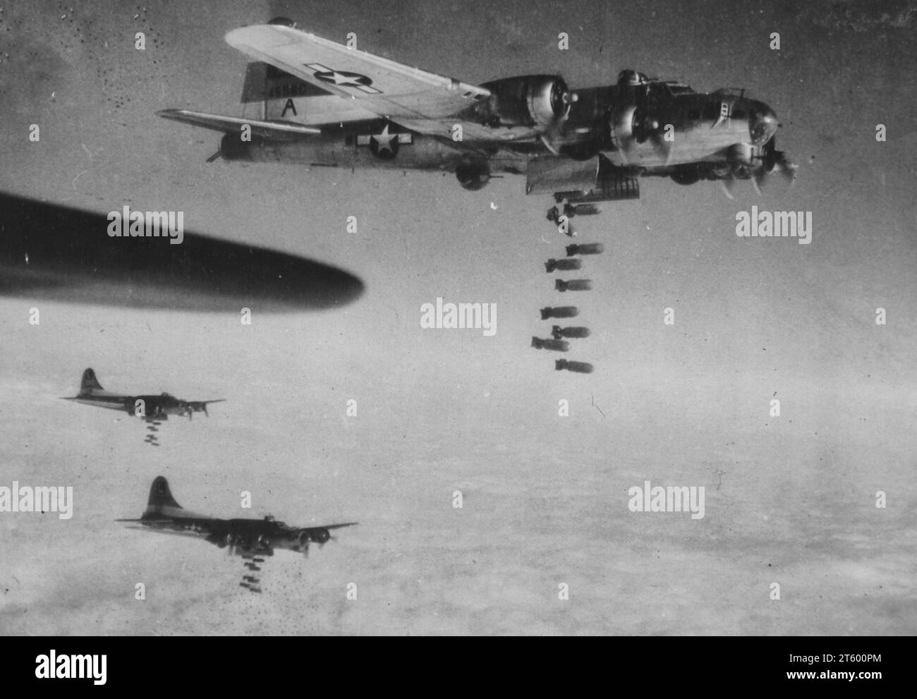 Boeing B-17 Flying Fortresses of the U.S. 8th Air Force's Third Air Division bomb German communications at Chemnitz marshalling yard, Germany, near Dresden on Feb 6, 1945. Cutting of rail lines here aided in shutting off the flow of supplies Stock Photo