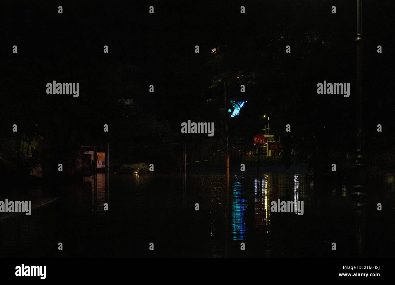 San Juan, USA. 06th Nov, 2023. A car left stranded after flooding forced its owner to flee to