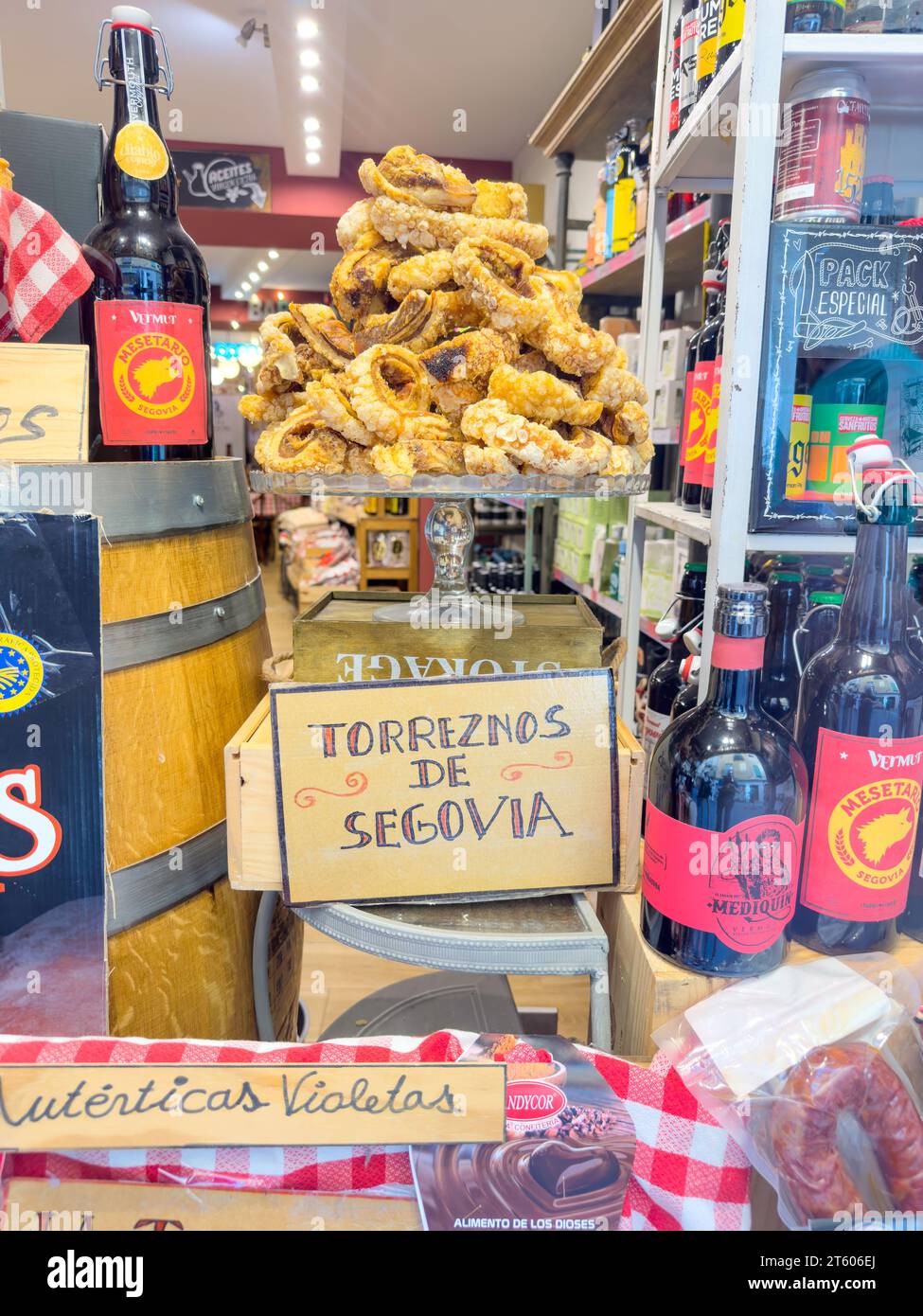 Torreznos de Segovia (savory snack) in shop window,  Calle Cervantes, Segovia, Castile and León, Kingdom of Spain Stock Photo