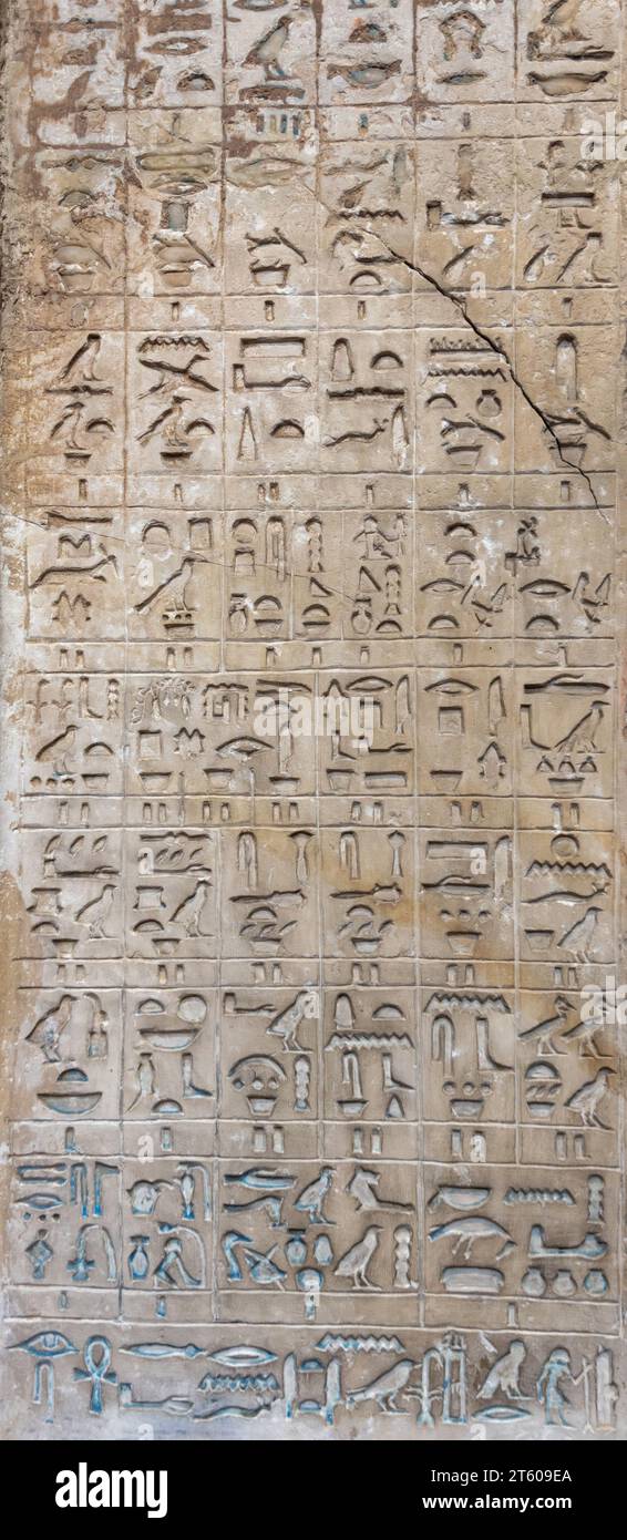 Drawings, images and hieroglyphic texts on ancient Egyptian walls Stock Photo