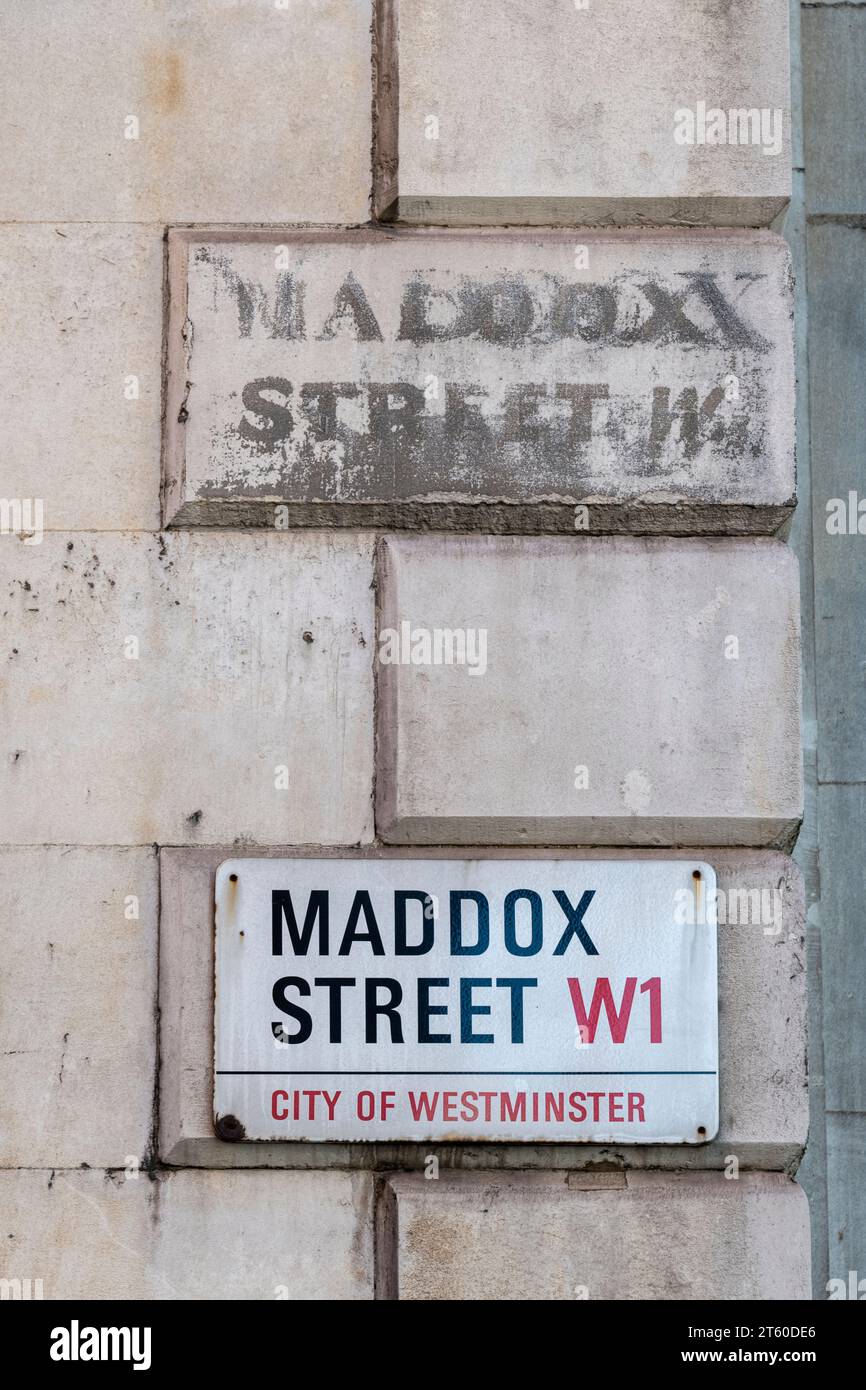 Old and New Street Signs in London's Maddox St in Westminster. Stock Photo
