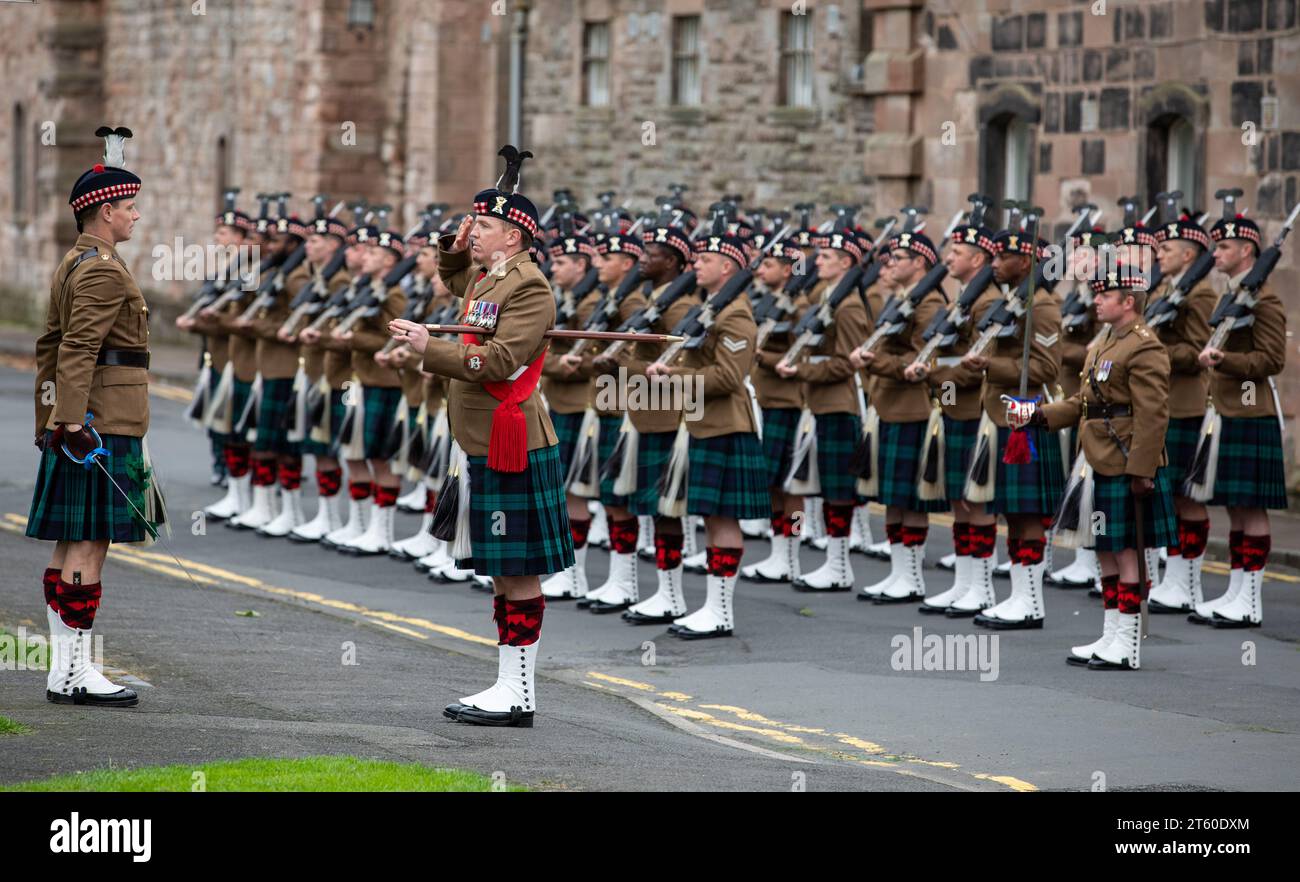Kilted soldiers parading outside the Barracks, Berwick upon Tweed, Northumberland, England, UK Stock Photo