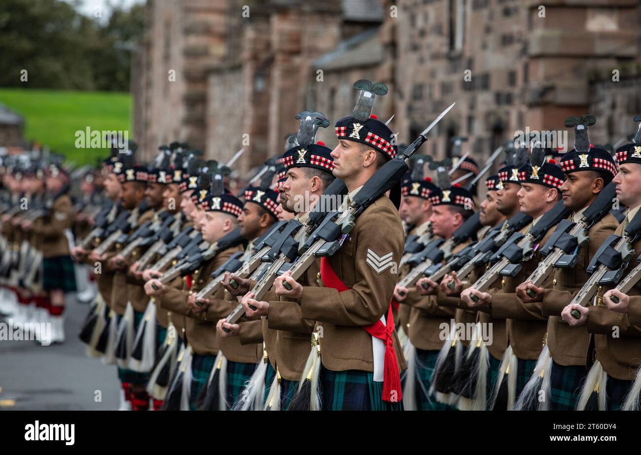 Kilted soldiers parading outside the Barracks, Berwick upon Tweed, Northumberland, England, UK Stock Photo