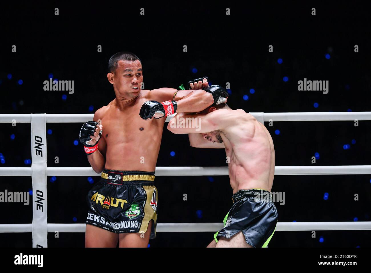 Saeksan Or. Kwanmuang (L) of Thailand and Karim Bennoui of French-Algerian seen in action during their match in ONE Fight Night 16 at Lumpinee Boxing Stadium. Stock Photo
