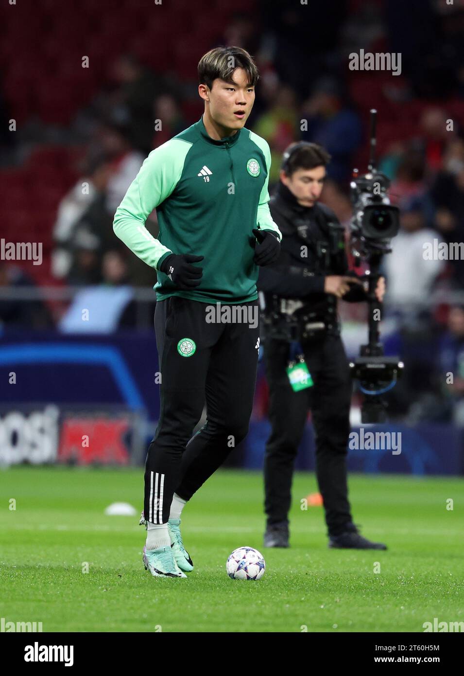 Celtic's Oh Hyeon-Gyu warming up prior to kick-off before the UEFA Champions League Group E match at the Estadio Metropolitano, Madrid. Picture date: Tuesday November 7, 2023. Stock Photo