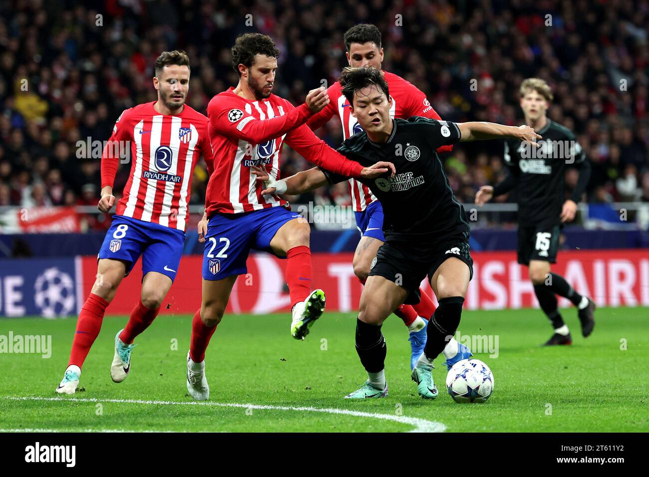 Celtic's Oh Hyeon-Gyu (right) and Atletico Madrid's Mario Hermoso battle for the ball during the UEFA Champions League Group E match at the Estadio Metropolitano, Madrid. Picture date: Tuesday November 7, 2023. Stock Photo