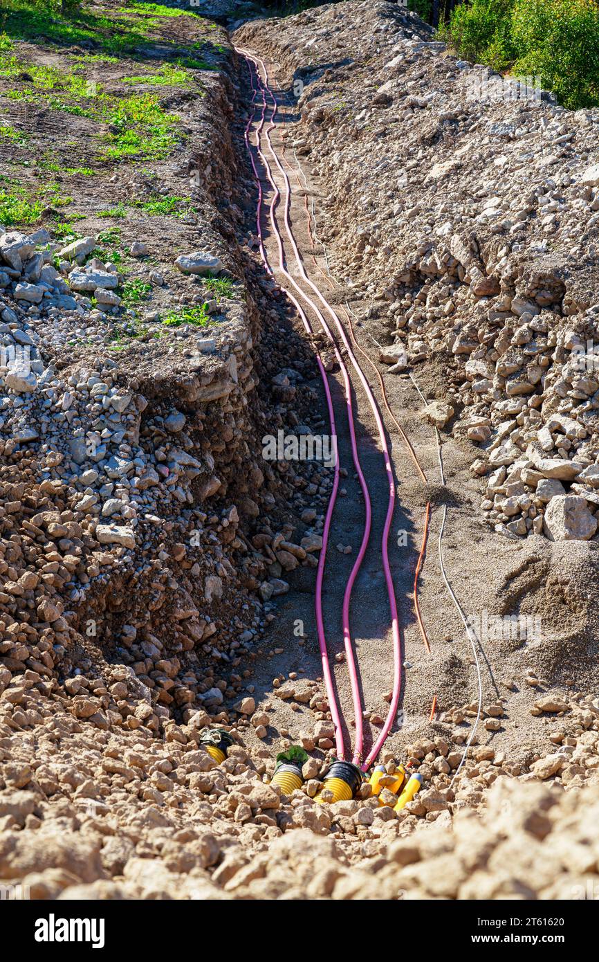 Laying HighVoltage Cables Underground Through the Forest to Connect