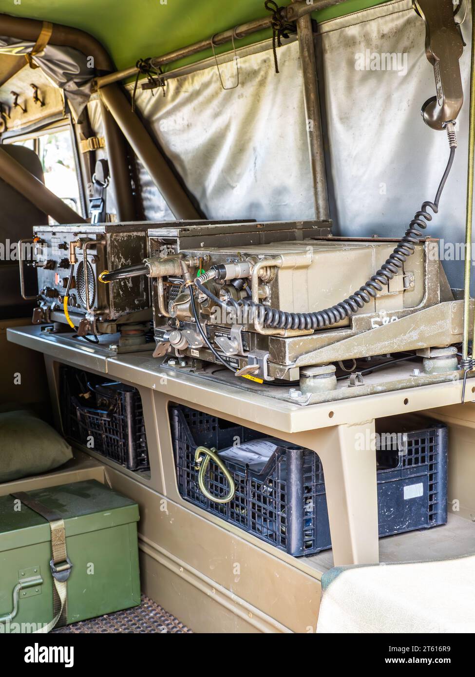 Military radio equipment in the rear of an Australian military vehicle - Land Rover Perentie Stock Photo